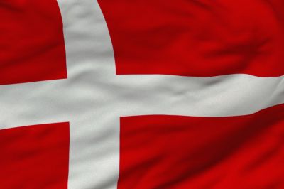 Danish Flag is red with a white Scandinavian cross that extends to the edges of the flag