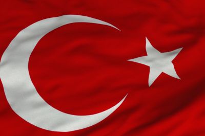 The flag of Turkey is a red flag with a white crescent moon and a star in its centre